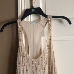 Adorable sequin dress with fringe bottom